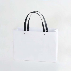 Paper bag with paper handle
